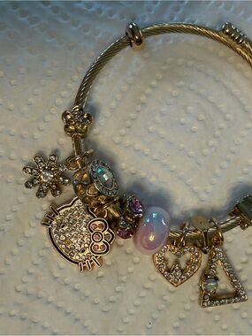 Hello Kitty Gold Charm Bracelet with Pink Opalescent Bead
